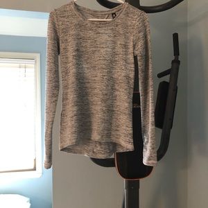 90 degree long sleeve shirt with open back. Size small. Gently used